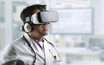 Doctor with virtual reality glasses