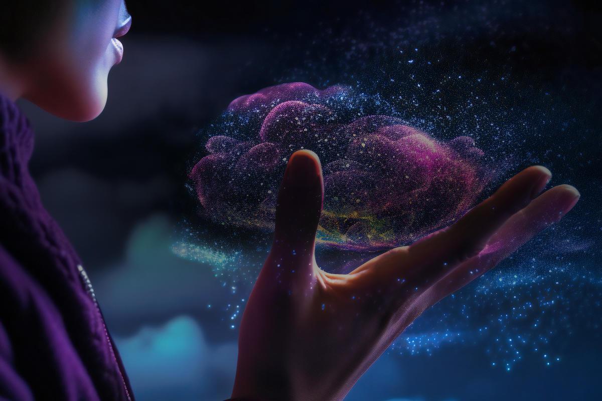 Close-up of a woman's hand holding a purple cloud in a technology ambience